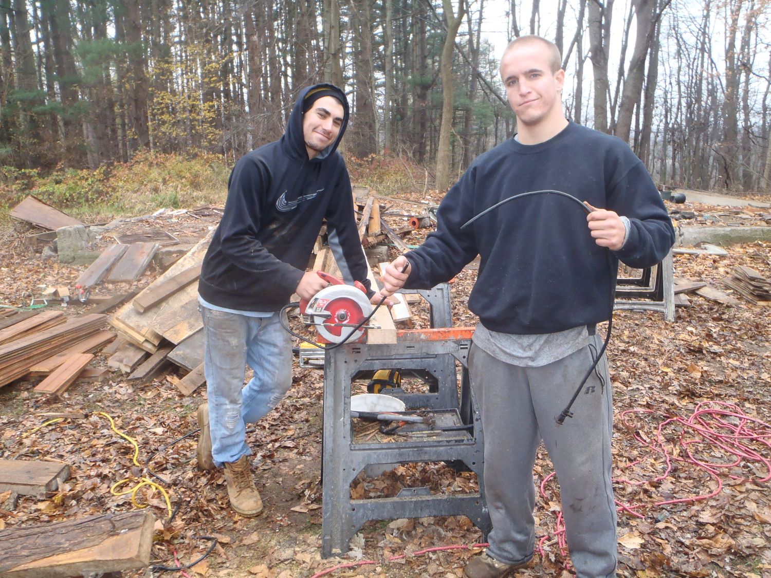 Oour demo guys holding the cut cord to a power saw