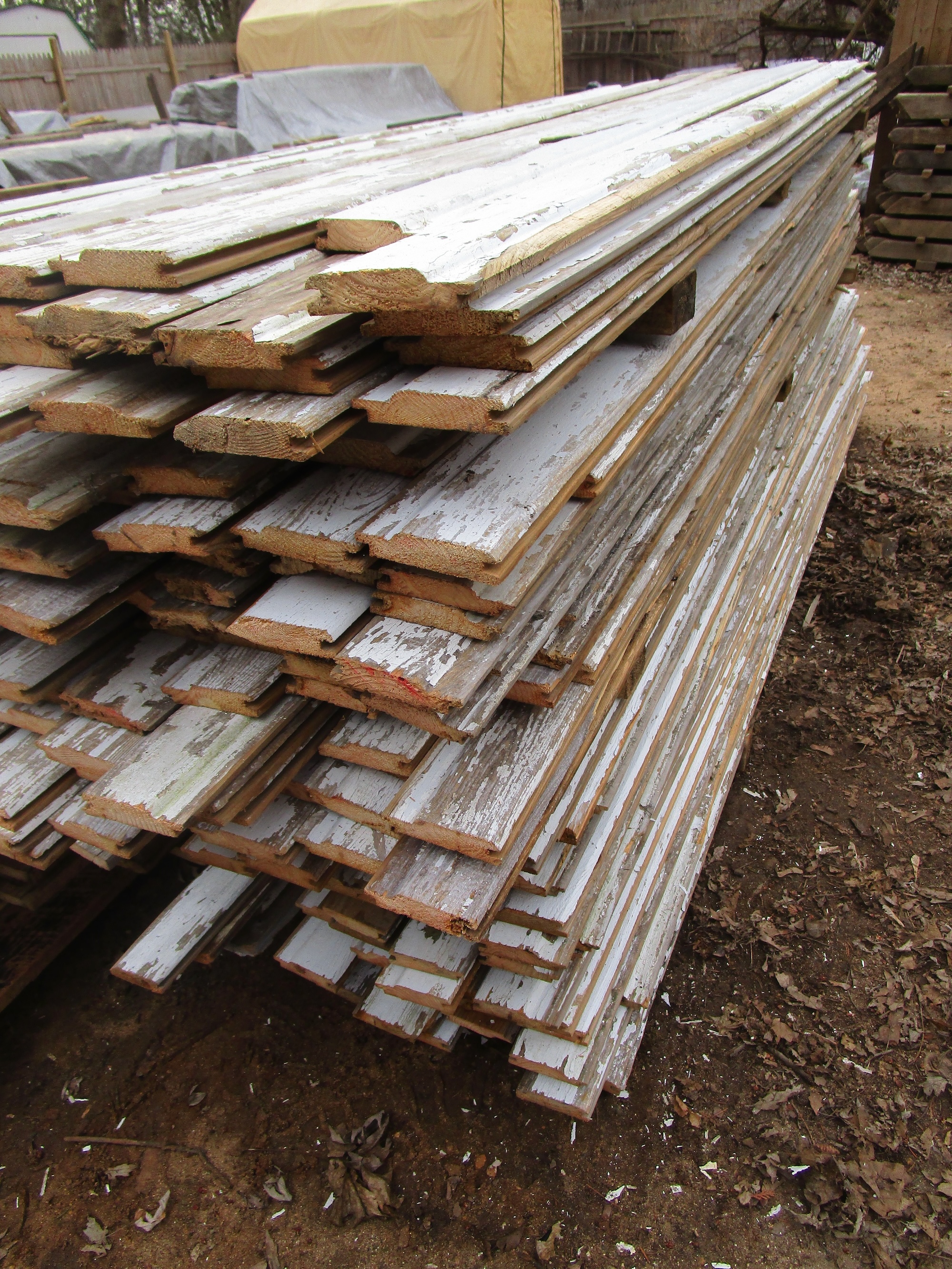 Stacked tongue and groove flooring outside one of our warehouses.